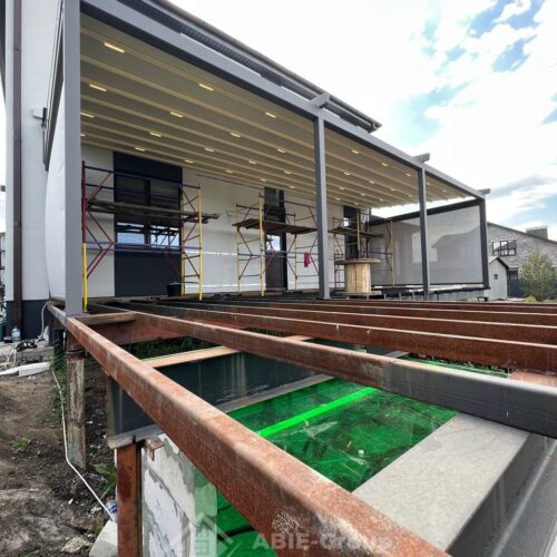 Фотографии выполненных работ компании «ABIE-GROUP» Алюминиевой перголы со сдвижным тентом, led подсветкой и вертикальной Zip системой. г.Белгород